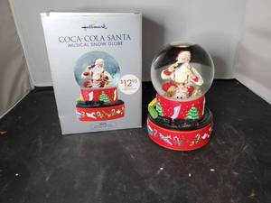 lot 8051 image: Hallmark Coca Cola Santa Globe