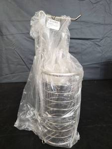 lot 7702 image: Silver Colored Toilet Paper Holder