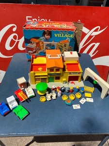 lot 2008 image: Vintage Fisher Price Play Family Village 1973