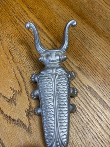lot 2035 image: Vintage Nifty Newts Bug Boot Jack