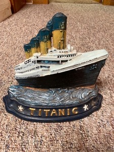lot 2062 image: Painted cast-iron titanic doorstop very heavy