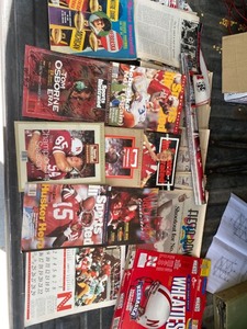 lot 2134 image: Large Nebraska Cornhuskers memorabilia lot Sports Illustrated Wheaties etc.