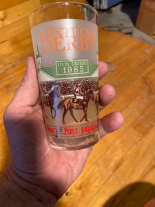 lot 2157 image: Four vintage glasses Kentucky derby Yellowstone national park Wyoming and Texas jiggers