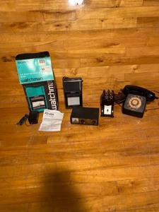 lot 2162 image: Lot of four items a Sony watchman television, Burton pipette shaker, rotary telephone, and Royce and Tana modulator