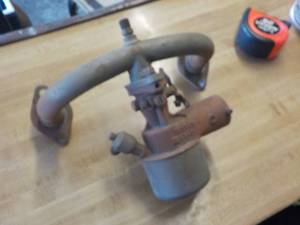 lot 5775 image: 1926 chevy intake and carb set