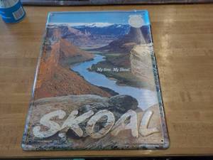 lot 5781 image: tin embossed skoal sign