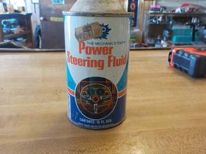 lot 5782 image: NOS power steering fluid can