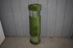 lot 68 image: Artificial Grass Rug 3 x 116