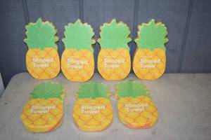 lot 356 image: 7 Sunny Life Pineapple Shaped Beach Towels