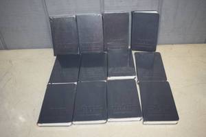 lot 287 image: 12 Angels Envy Bourbon Pocket Moleskin Notebooks 3.5 x 6