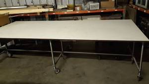 lot 61 image: 12 foot x 5 foot Bakery Table on Casters