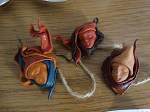 lot 3055 image: Lot of 3 handmade leather mask pins- Signed by artist
