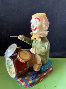 lot 6410 image: Antique Alps Battery Operated Clown Playing Drums