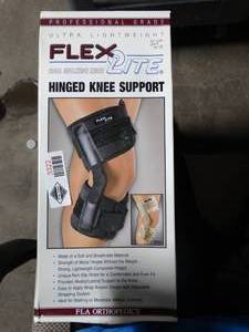 lot 3322 image: FLA Orthopedics Flex-Light Hinged Knee Support - XX Large