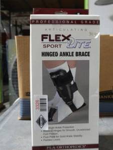 lot 3326 image: FLA Orthopedics Flex-Light Hinged Ankle Brace  - Size Medium