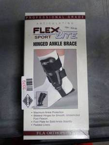 lot 3379 image: FLA Orthopedics Flex-Light Hinged Ankle Brace  - Size Medium