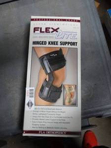 lot 3701 image: FLA Orthopedics Flex-Light Hinged Knee Support   - Size XLarge