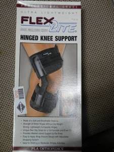 lot 3702 image: FLA Orthopedics Flex-Light Hinged Knee Support  - Size Small