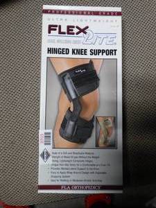 lot 3703 image: FLA Orthopedics Flex-Light Hinged Knee Support - Size Medium