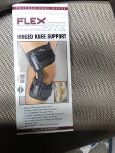 lot 3704 image: FLA Orthopedics Flex-Light Hinged Knee Support - Size Large