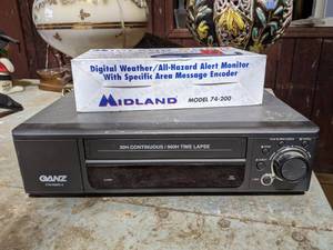 lot 5099 image: Midland Digital Weather All-Hazard Alert Monitor, Ganz VHS Security Camera Recorder