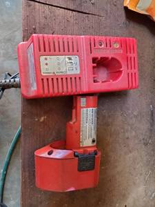 lot 5116 image: Milwaukee Class 2 Battery Charger With 12V Battery