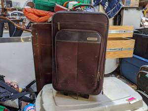 lot 5205 image: World Bound Rolling Suitcase
