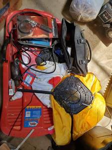 lot 5063 image: Red Sled, Inflatable Character, Gear Wrench, Bag Of Flasks and More