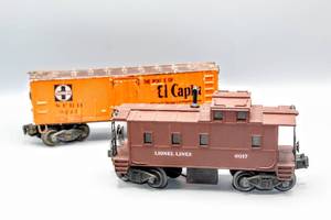 lot 4228 image: Lionel Train O Scale (2), Vintage Brown Caboose with Smoke Stack 6017 and Santa Fe Freight Car 9247 Ship and Travel Santa Fe All the Way