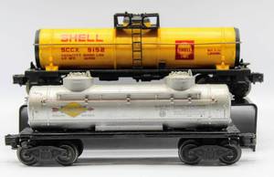 lot 4174 image: Lionel Train Lot of 2 Tank Cars - 9152 Shell Tank Car and 6465 Sunoco Tank Car
