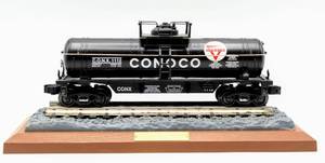 lot 4180 image: Conoco General Purpose Riveted Tank Car Circa 1934 on Display Pedestal Bank