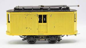 lot 4201 image: Metal Yellow Train Car, appears old with no markings.