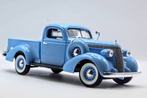 lot 4322 image: Lot of (4) Collectible Die Cast Model Trucks Limited Edition Liberty Classics1948 Ford #6123, Black 1941 Plymouth Truck, 1955 Chevy Step-side 124 Scale, 1937 Studebaker Coupe Express Pickup #92468 118 Scale