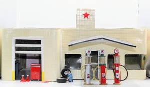 lot 4337 image: Model Texaco Station with 3 Metal Texaco Gas Pumps, Mechanic Figurine, Tires, Red Standing Tool Box, Red Jacks ...