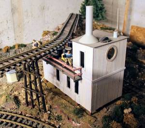 lot 4336 image: Model Kit Lot - Building with watch deck, Small Elevated Outbuilding and Outhouse with Metal Tub - All people & accessories shown are included