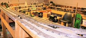 lot 4128 image: 16 ft x 13 ft Lionel O Gauge 3 LEVEL ELEVATED TRAIN SET LAYOUT  with 2 Lionel Transformers, Lights, Turntable, Gauge Switches, Lights throughout and Much More SEE THE VIDEO