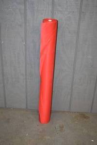 lot 101 image: Red Landscape Fabric 36 x 100 feet