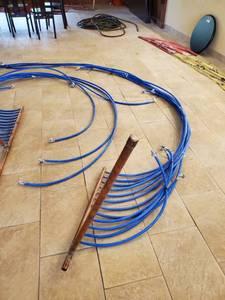 lot 4635 image: 12 Manifold Pex Tubing With Shut Off Valves