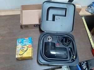 lot 1932 image: Cen-Tech 12 Volt Car Battery Float Charger and 12V Compressor
