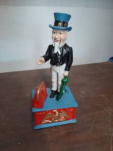 lot 3320 image: Cast Iron Uncle Sam Mechanical Bank