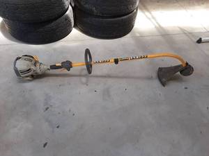 lot 3349 image: Ryobi String Trimmer - has Compression
