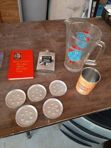 lot 3395 image: Cessna Coasters, Flask and Bar Book (Pitcher has a chip)