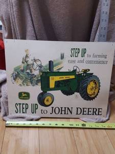 lot 7100 image: Metal John Deere sign