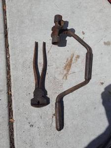 lot 7109 image: Dog bone speed wrench and fencing pliers