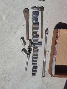 lot 7117 image: Assorted 12 inch Drive sockets. Most are Proto