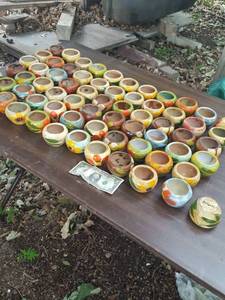 lot 6249 image: approximately 65 small Mexican pots. Hole in bottom