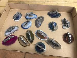 lot 6367 image: 15 motorcycles on geode slabs, very small figurines