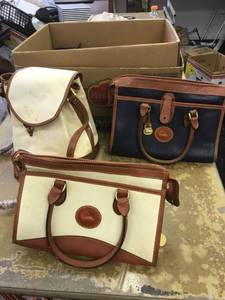 lot 6456 image: 3 Dooney and Bourke leather bags. 2 shoulder rises, 1 crossbody (dirty and missing label)