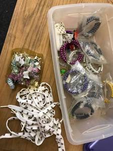 lot 6484 image: bracelets, laces, butterfly clips