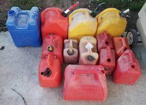 lot 4057 image: 12 fuel cans and 1 water jug